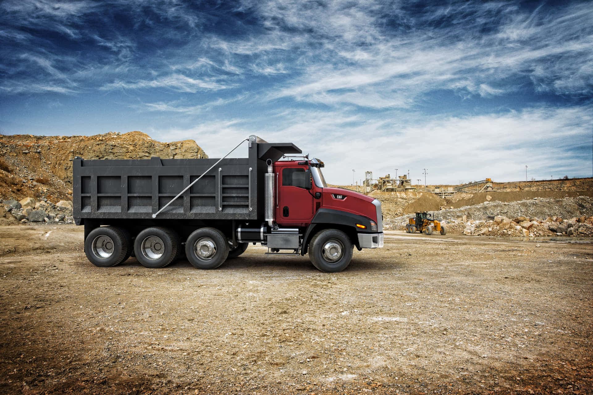 Dump truck hauling dirt at a Southern California construction site